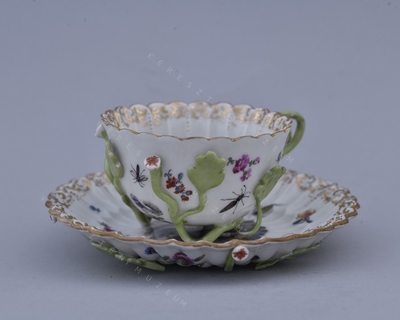 Cup with saucer