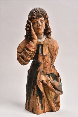 Fragment of a statue of a male s...