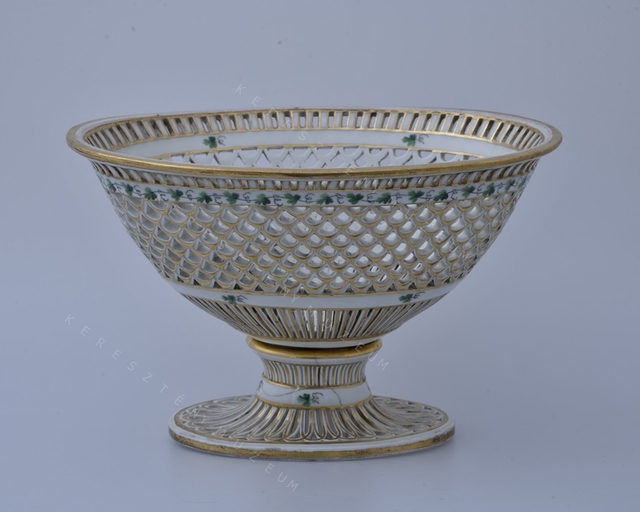 Footed openwork fruit basket